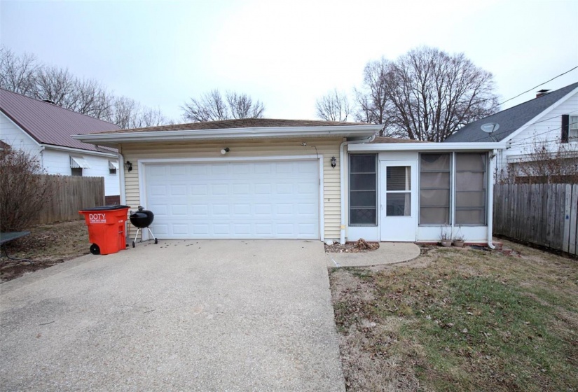 Ranch-style house featuring a garage