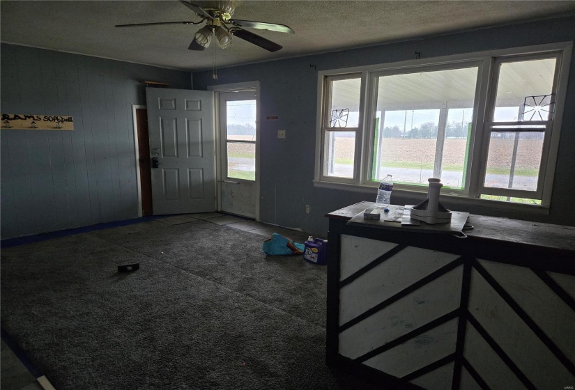 View of front door and screened in porch